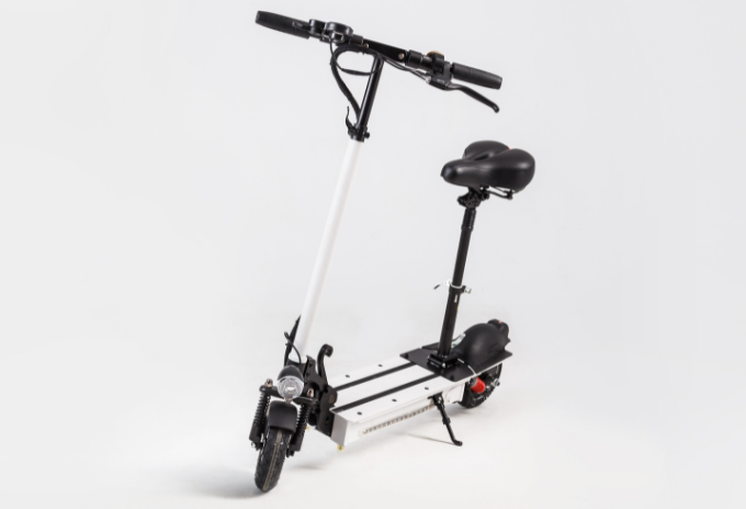 Black and white electric scooter with seat attached, on a white background